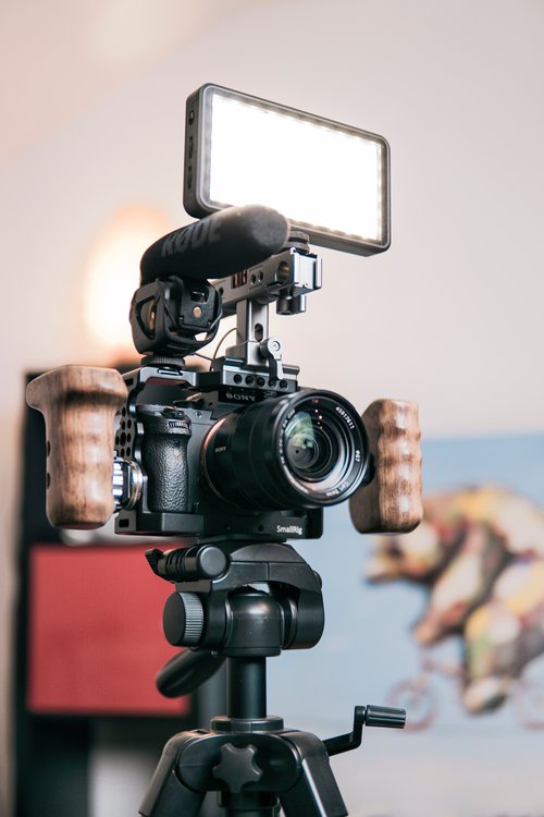 DSLR camera with microphone and lighting